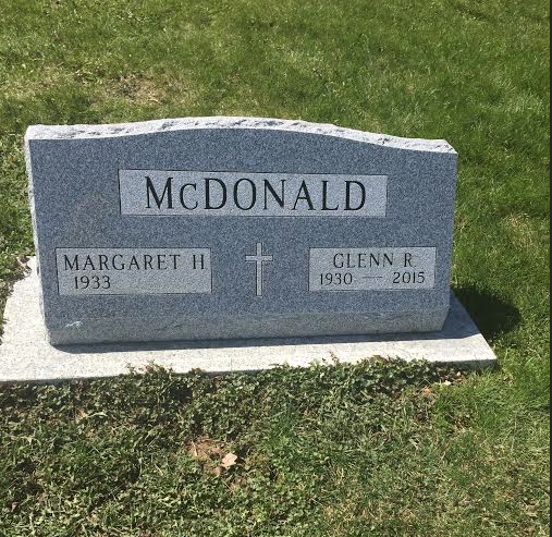 The gravestone that took 10 months to get finished, all because I demanded there be a lower case "C" in McDonald and it fouled up their stonecutting logistics.